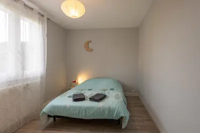 Un ou plusieurs lits dans un hébergement de l'établissement Douce Écume - Maison à moins dun km de la plage
