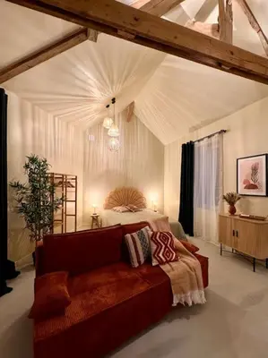 Coin salon dans l'établissement Charmant loft intime