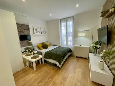 Un ou plusieurs lits dans un hébergement de l'établissement Appartement cosy hyper centre
