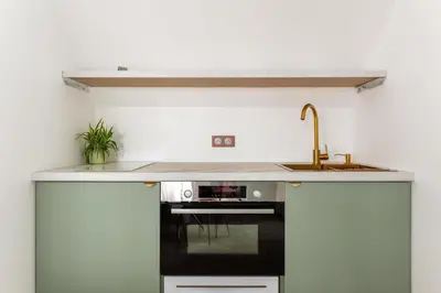 Cuisine ou kitchenette dans l'établissement Studios Le Médicis