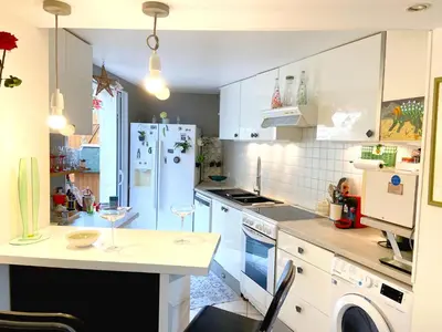 Cuisine ou kitchenette dans l'établissement Maison de charme d'Ile de France