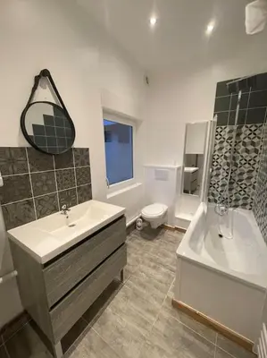 Salle de bains dans l'établissement L’aire bucheoise