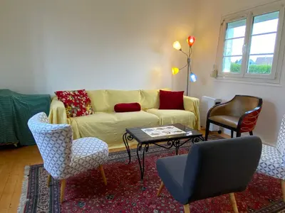 Coin salon dans l'établissement La Maison du Chemin Vert