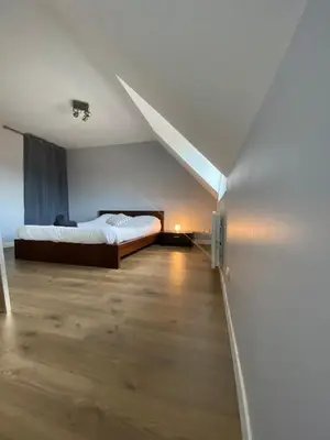 Un ou plusieurs lits dans un hébergement de l'établissement 2 chambres Hyper centre avec place de Parking et WIFI