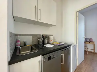 Cuisine ou kitchenette dans l'établissement St Aubin Gare - Appartement cosy proche commerces