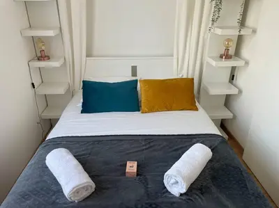 Un ou plusieurs lits dans un hébergement de l'établissement St Aubin Gare - Appartement cosy proche commerces