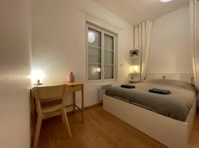 Un ou plusieurs lits dans un hébergement de l'établissement St Aubin Gare - Appartement cosy proche commerces