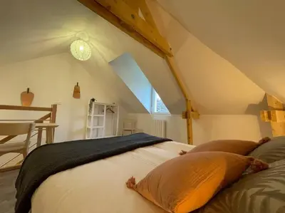 Un ou plusieurs lits dans un hébergement de l'établissement Thuit de l'Oison - Magnifique appart F2 duplex