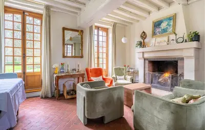 Coin salon dans l'établissement Magnifique Maison Avec Piscine