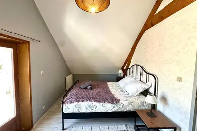 Un ou plusieurs lits dans un hébergement de l'établissement Le Gîte d’en Bas-St Valery à 15min-Équipement bébé