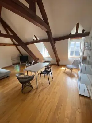 Coin salon dans l'établissement APPARTEMENT VICTOR HUGO