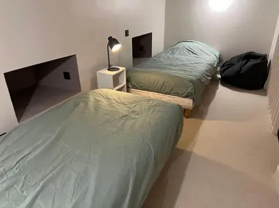 Un ou plusieurs lits dans un hébergement de l'établissement Loft convivial et spacieux, comme une maison