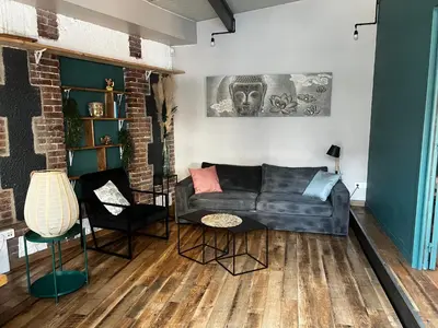 Coin salon dans l'établissement Maison la clé du soi