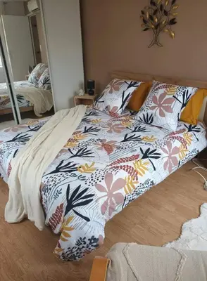 Un ou plusieurs lits dans un hébergement de l'établissement Gîte l'Olivier