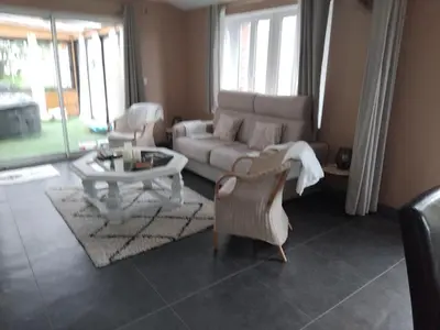Coin salon dans l'établissement Gîte l'Olivier