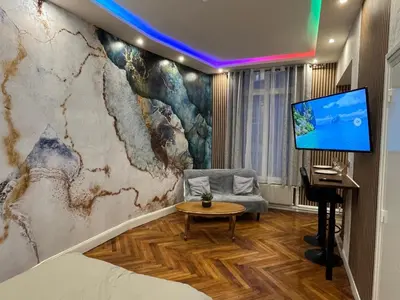 Télévision ou salle de divertissement dans l'établissement Appartement Cosy•Gare• Centre-ville