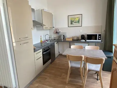 Cuisine ou kitchenette dans l'établissement Établissement 3 étoiles avec ASCENSEUR, 3 appartements lumineux vue port avec balcon, 200m de la mer, Wifi Fibre, tous service inclus
