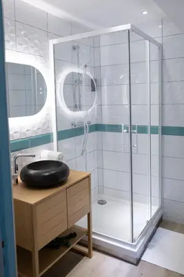 Salle de bains dans l'établissement L'annexe du Vivier