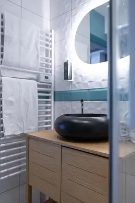 Salle de bains dans l'établissement L'annexe du Vivier