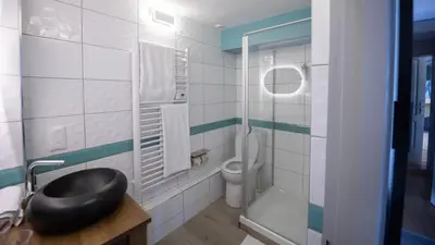 Salle de bains dans l'établissement L'annexe du Vivier