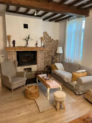 Coin salon dans l'établissement Maison Normandie
