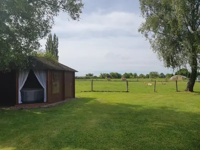 Jardin de l'établissement Le cottage des quatre vents