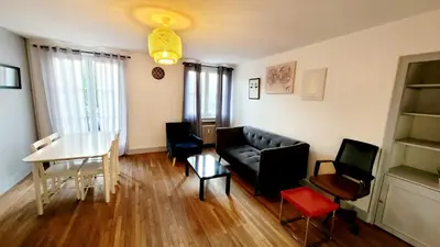 Coin salon dans l'établissement Appartement meublé Hypercentre Beauvais - 1h de Paris