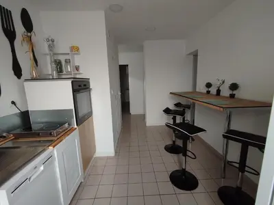 Cuisine ou kitchenette dans l'établissement Maison de Ville à 40 km de Paris