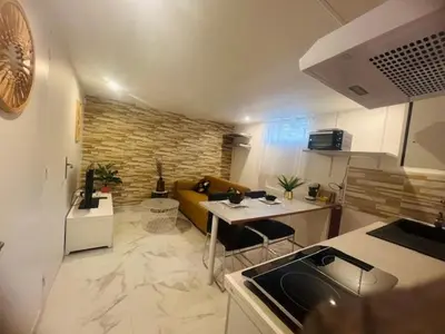 Cuisine ou kitchenette dans l'établissement Appartement indépendant chez l'habitant