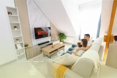 Télévision ou salle de divertissement dans l'établissement Coup de Coeur des Voyageurs - Propre, confort et Entrer autonome - Bonn'appartts-sur-Seine