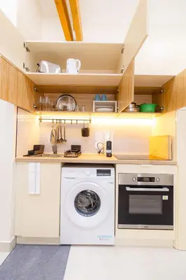 Cuisine ou kitchenette dans l'établissement Coup de Coeur des Voyageurs - Propre, confort et Entrer autonome - Bonn'appartts-sur-Seine