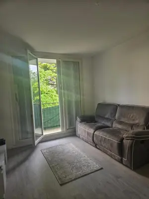 Coin salon dans l'établissement Appartement T3 tout confort
