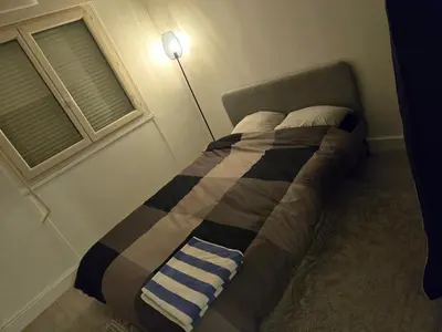 Un ou plusieurs lits dans un hébergement de l'établissement Appartement T3 tout confort