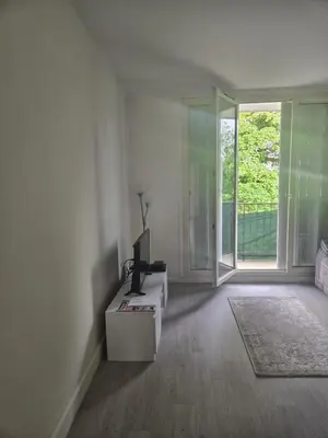 Télévision ou salle de divertissement dans l'établissement Appartement T3 tout confort