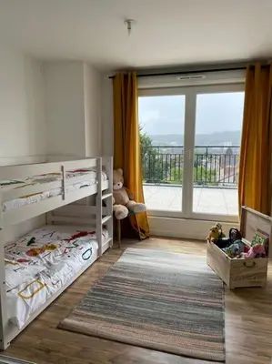 Un ou plusieurs lits dans un hébergement de l'établissement Appartement 3P Gare Terrasse et Parking privé
