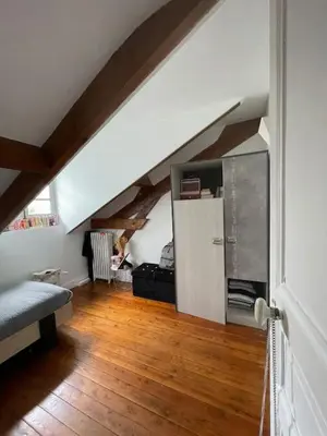 Un ou plusieurs lits dans un hébergement de l'établissement Maison 20 min de PARIS