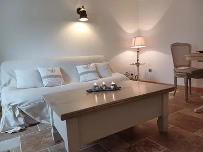 Coin salon dans l'établissement LOVE ESCAPADE