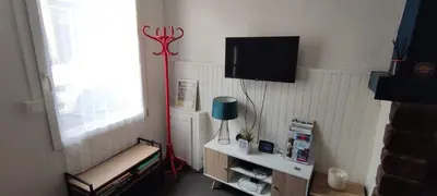 Télévision ou salle de divertissement dans l'établissement L'Auxy
