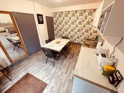 Cuisine ou kitchenette dans l'établissement Tropicana - 297