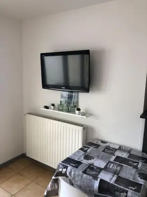 Un ou plusieurs lits dans un hébergement de l'établissement Joli Studio au calme mais proche gare et bus
