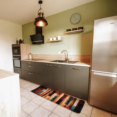 Cuisine ou kitchenette dans l'établissement Espace et confort