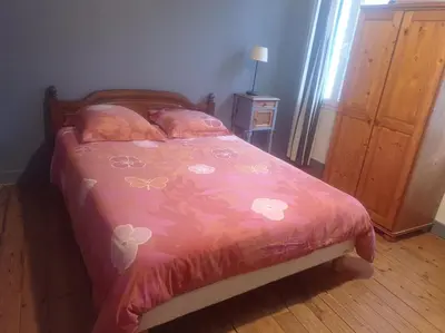Un ou plusieurs lits dans un hébergement de l'établissement La maison de Nina