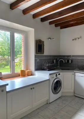 Cuisine ou kitchenette dans l'établissement Charmante Maison Normande