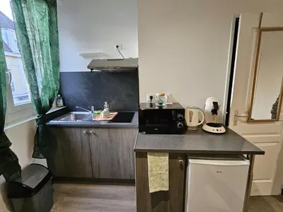 Cuisine ou kitchenette dans l'établissement Residance Nassau logement 1
