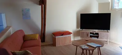 Télévision ou salle de divertissement dans l'établissement Gite la pause picarde