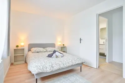 Un ou plusieurs lits dans un hébergement de l'établissement Le Gabriel - Maison spacieuse et calme près de Paris