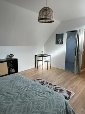 Un ou plusieurs lits dans un hébergement de l'établissement Le Nid des Voyageurs - chambre Eurylaime