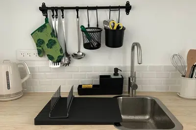 Cuisine ou kitchenette dans l'établissement Au coeur du centre ville