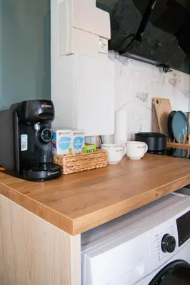 Cuisine ou kitchenette dans l'établissement Appartement entier cosy