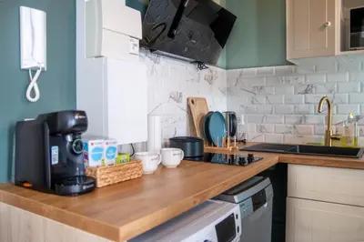 Cuisine ou kitchenette dans l'établissement Appartement entier cosy